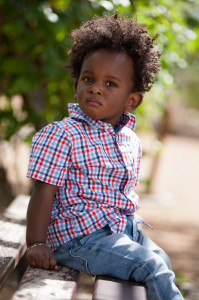 http://www.dreamstime.com/royalty-free-stock-images-outdoor-portrait-black-baby-sited-bench-image25197469